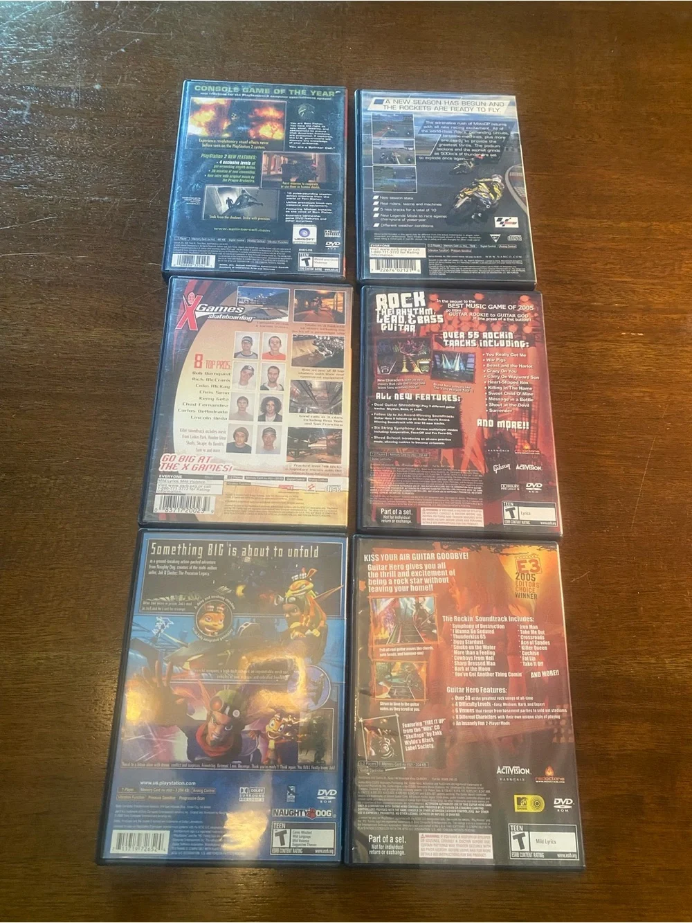 6 PS2 Jak II, Guitar Hero I & II, Splinter Cell, MotoGP 2, X Games Skateboarding